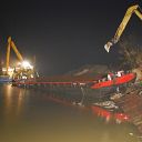 night, rain, excavator, barge