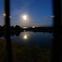 night, moon, water basin, fence