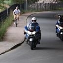 Falkensteiner Ufer, riding bicycle, police, police motorcycle